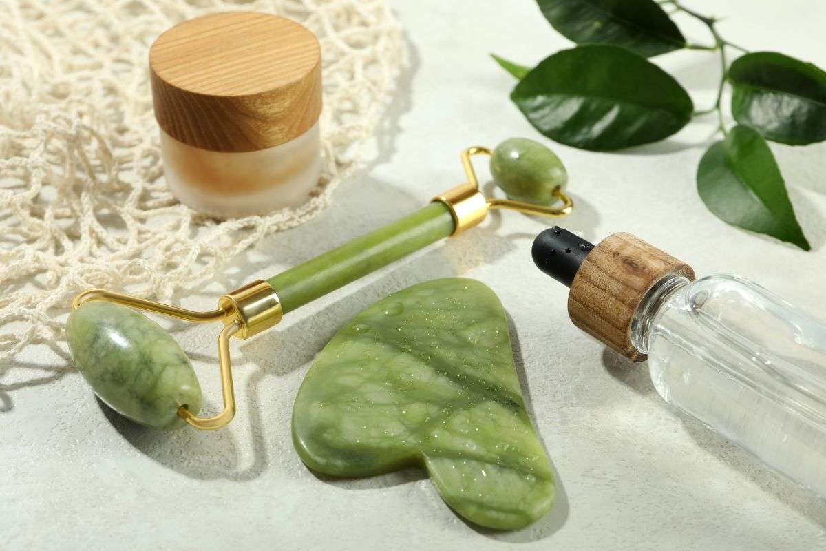 gua sha skin benefits, facial lymphatic drainage massage, jade stone skincare tool, natural anti aging facial therapy